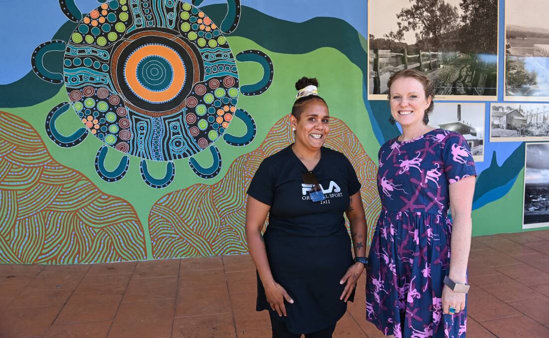 Proud pair: Tamara Murray and Lisa Goff whose artwork bookends the mural along the Borella Road frontage of the East Albury supermarket. Picture: MARK JESSER