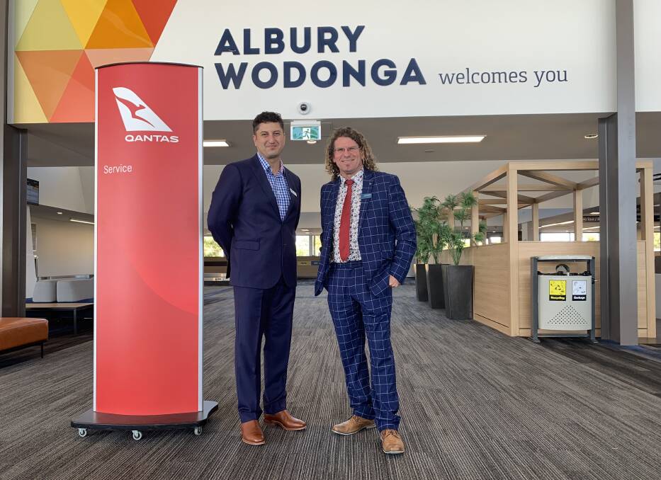 Croweaters come on over: Airport boss Nick Politis and Albury deputy mayor Steve Bowen are delighted flights to Adelaide will be introduced by Qantas from July.