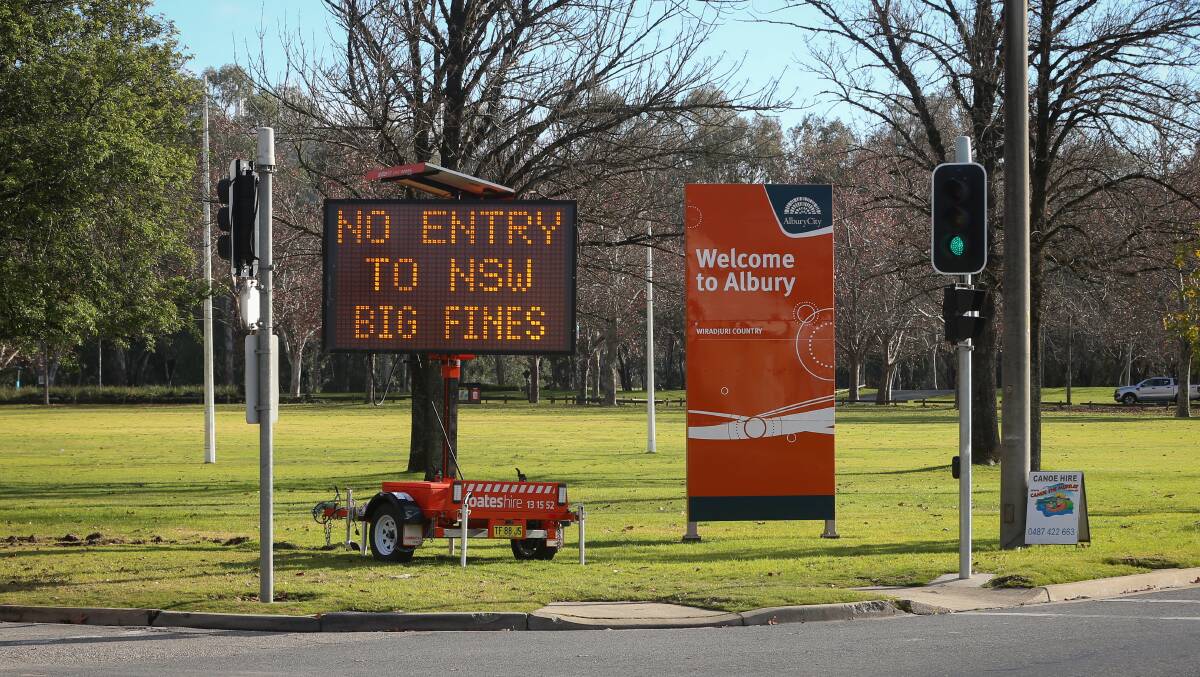 Mixed messages: The entrance to Albury at Wodonga Place illustrates how the border closure means travellers are not welcome.