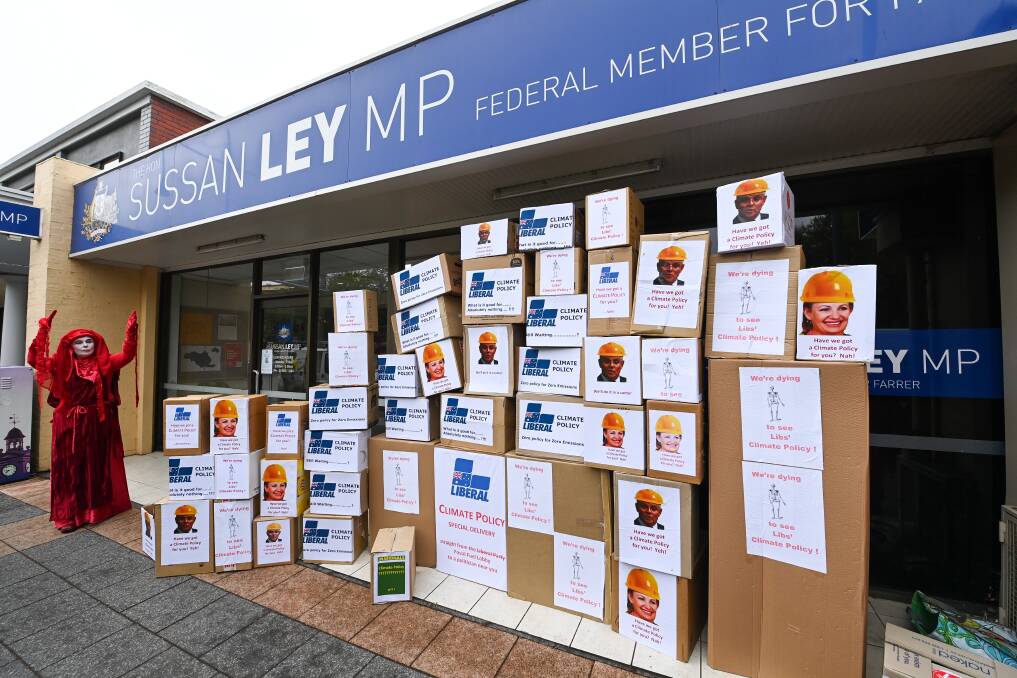 Flashback: Boxes slamming federal climate change policy left at Sussan Ley's office in March. Now Albury councillor John Stuchbery has called for Commonwealth action. 