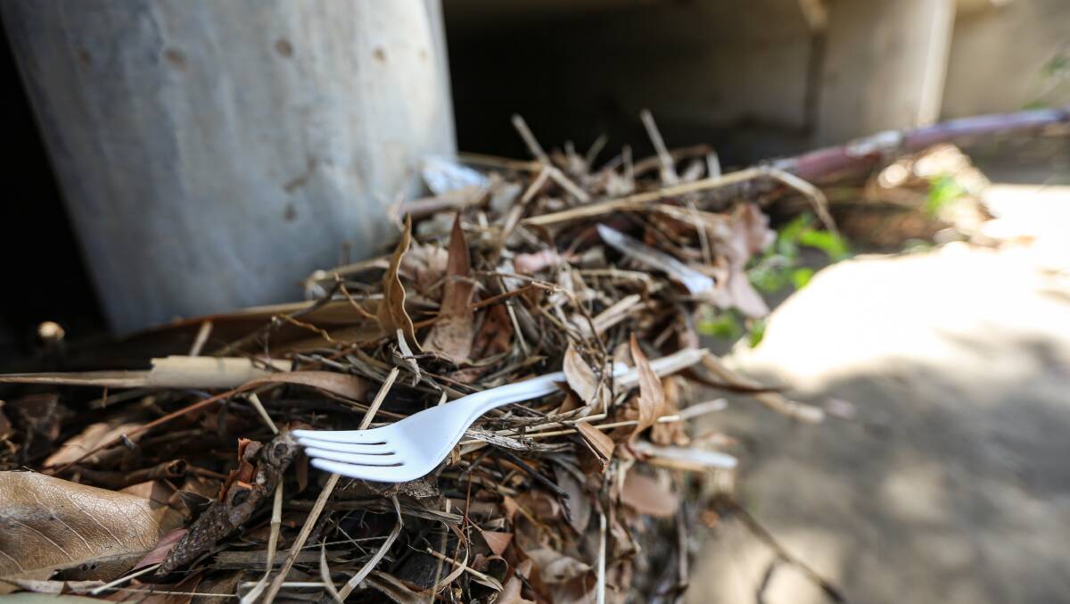 Thrown away: A plastic fork is left to break down in the sun in South Albury. Picture: JAMES WILTSHIRE
