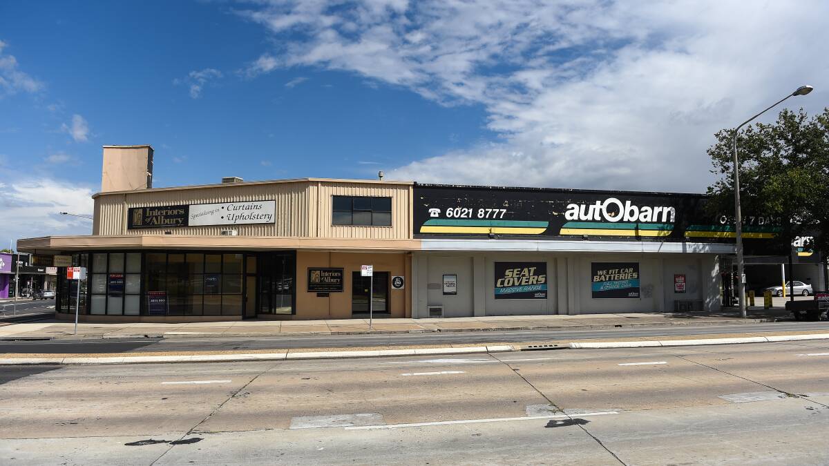 Coming soon: The Autobarn livery its old store in Albury's Young Street will soon be disappearing and replaced with the colours of discount grocer NQR. Picture: MARK JESSER