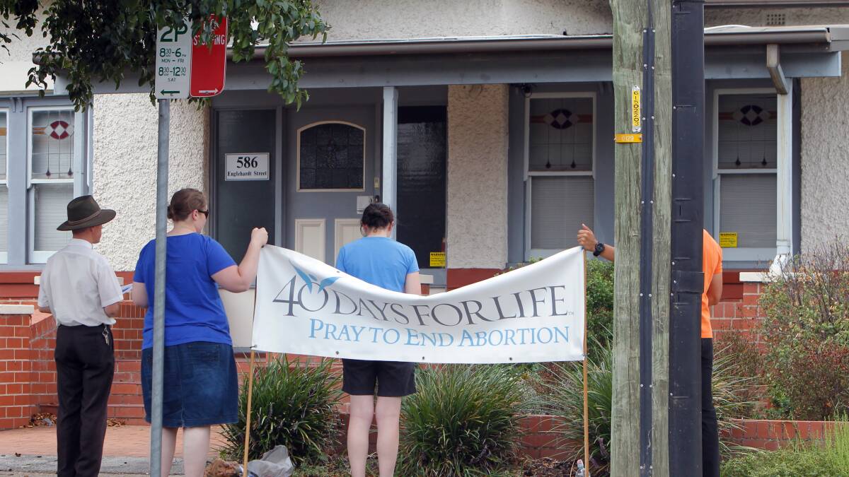 End may be nigh: Protests such as these outside Albury's Englehardt Street abortion clinic, would be banned under a bill now before NSW politicians.