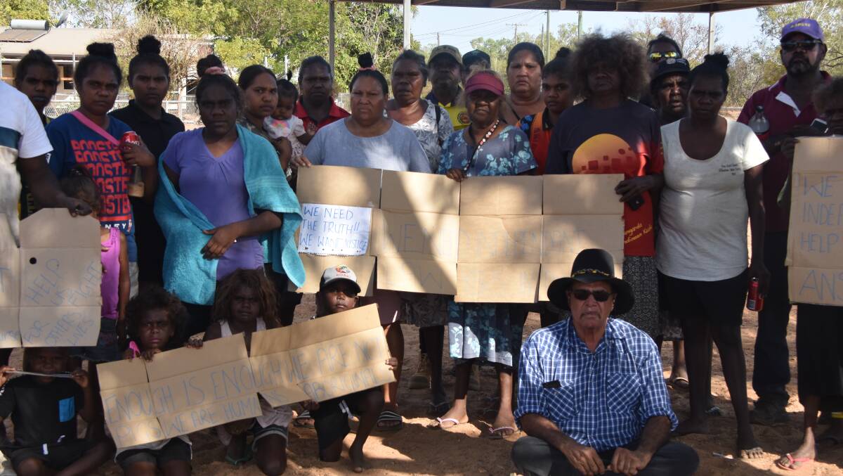 UNHAPPY: Doomadgee residents hold a protest on Monday over recent deaths at the local hospital. Photo: Aidan Green
