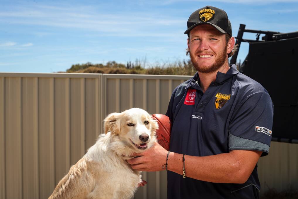 Connor Newnham has been enjoying his summer playing cricket and spending time at work with his dog, Honey. Picture by James Wiltshire