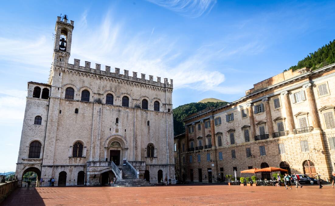 The Palazzo dei Consoli overlooking a public square in the Umbrian city of Gubbio.
