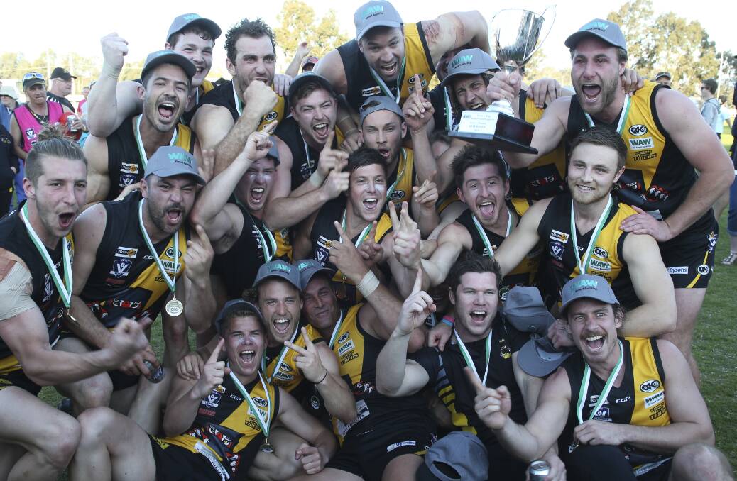 PREMIERS: Glenrowan celebrates its grand final win over Milawa in Saturday's Ovens and King grand final at the W.J. Findlay Oval. Pictures: ELENOR TEDENBORG