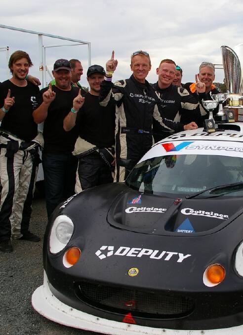 WINNERS ARE GRINNERS: The Shelley team at Winton with their Lotus Elise.