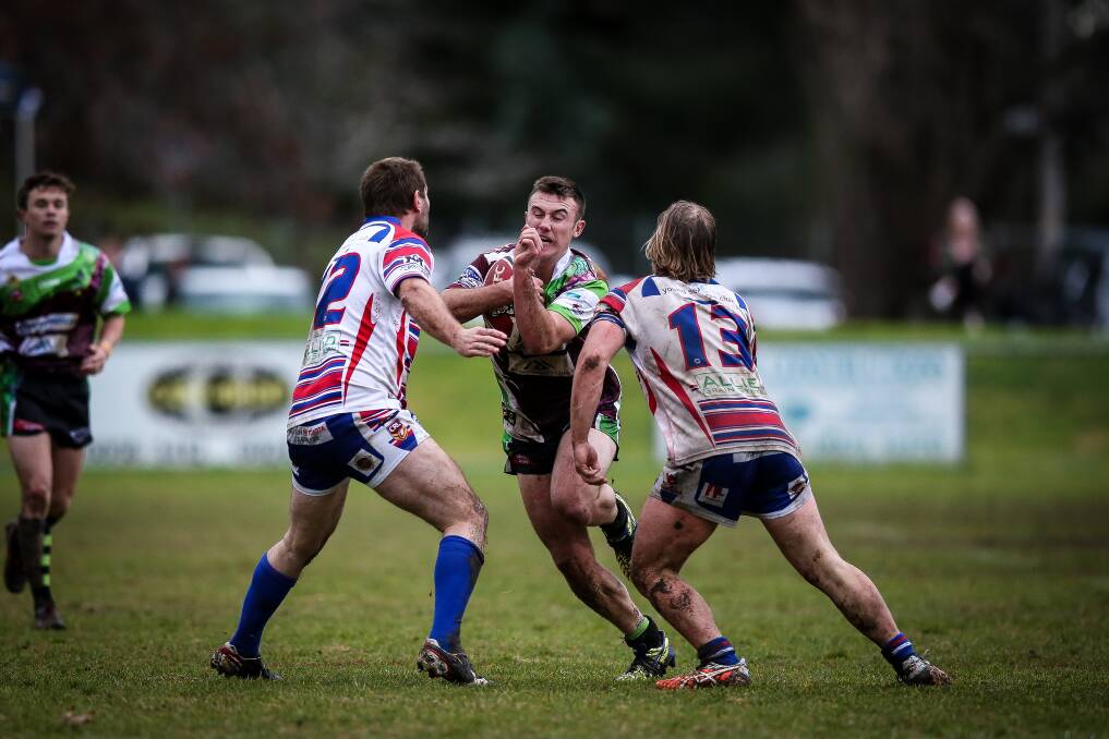 Albury Thunder's Liam Wiscombe carries the ball in a typically bruising run.