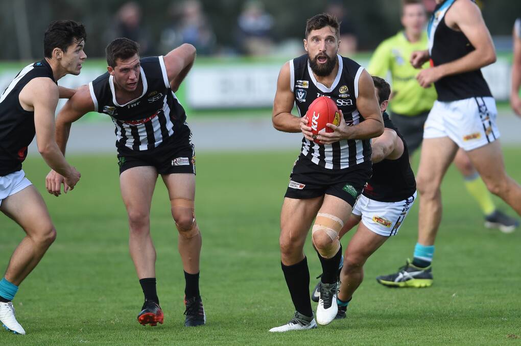Wangaratta's Ben Douthie is a vital member of the team's defence, which teams have found difficult to break down during its 11-match winning streak. The Pies haven't lost since falling to Myrtleford on June 8.