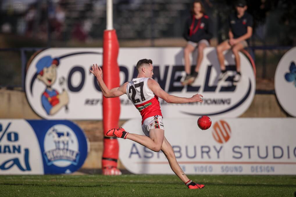 MATCH-WINNER: Myrtleford's Lachie Dale kicked the winning goal against Wodonga Raiders in the final minute. Pictures: JAMES WILTSHIRE