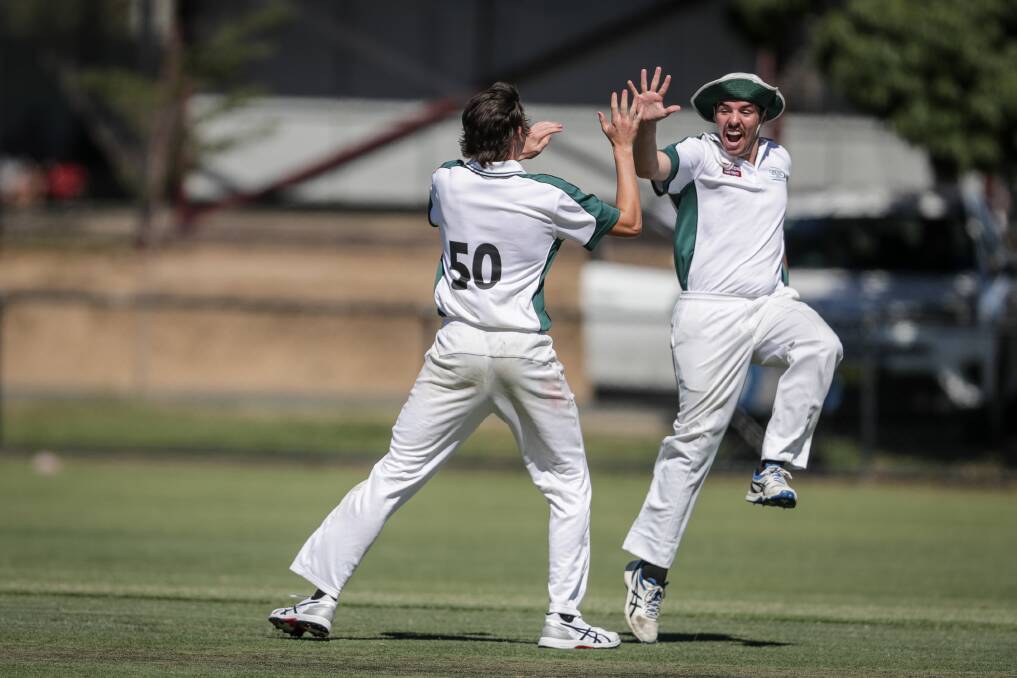 HIGH FIVE: CAW celebrates a wicket in the Country Week under 16 grand final against Wangaratta Blue. Pictures: JAMES WILTSHIRE