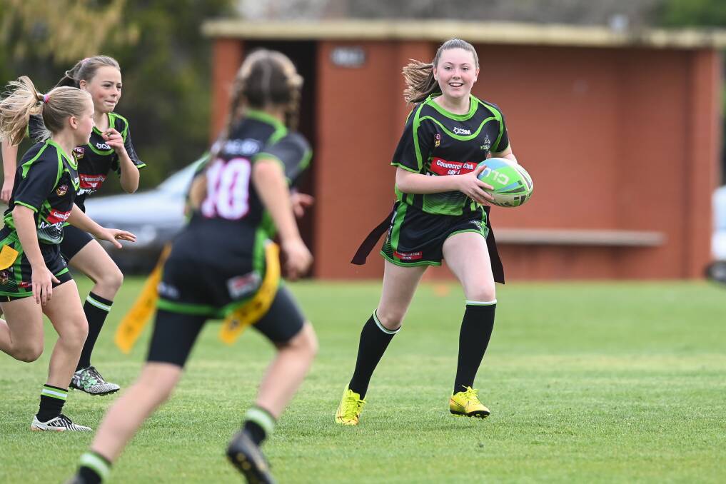 FUN TIMES: Albury Thunder Junior Rugby League Club hosted a shortened season and here's an example of the reason with Paige Moran having a ball.