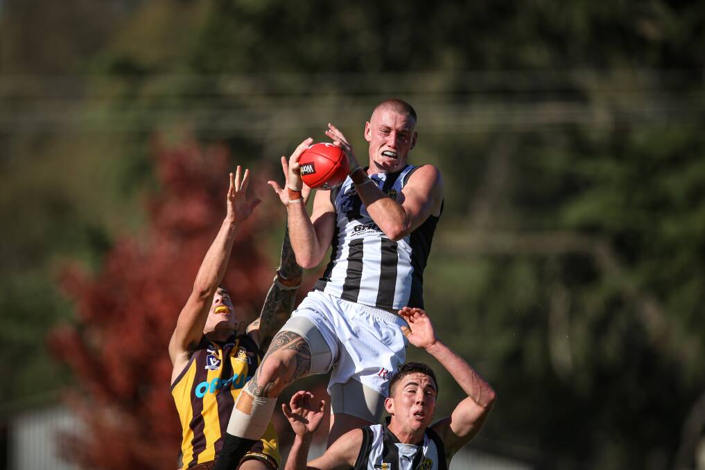 Wangaratta's Callum Moore took a mark of the year contender against Wangaratta Rovers in round three. Moore was the Pies' best in a beaten side.