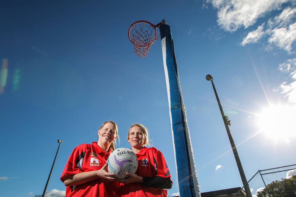 Jaclyn McAlpine (left) and Marnie Doodeward celebrated their 200th and 150th games respectively in May, 2014.