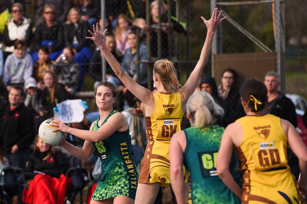 COOL AND CALM: Tallangatta goal shooter Emily Rodd (with ball) won best on court with a composed display, particularly in the frenetic extra-time. Picture: MARK JESSER