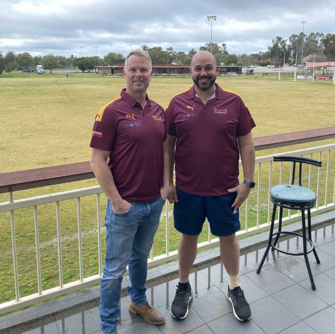 Barooga coach Tim Hargreaves (left) with club president Marcus Fry after the pair agreed to terms on Saturday. Picture: BAROOGA FC
