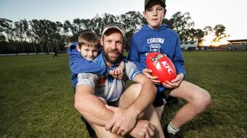 Kade Kuschert played his 300th game for the Roos in 2018, with sons Hudson, then 8, and Judd, then 12, supporting dad. Now Judd is playing alongside his father.