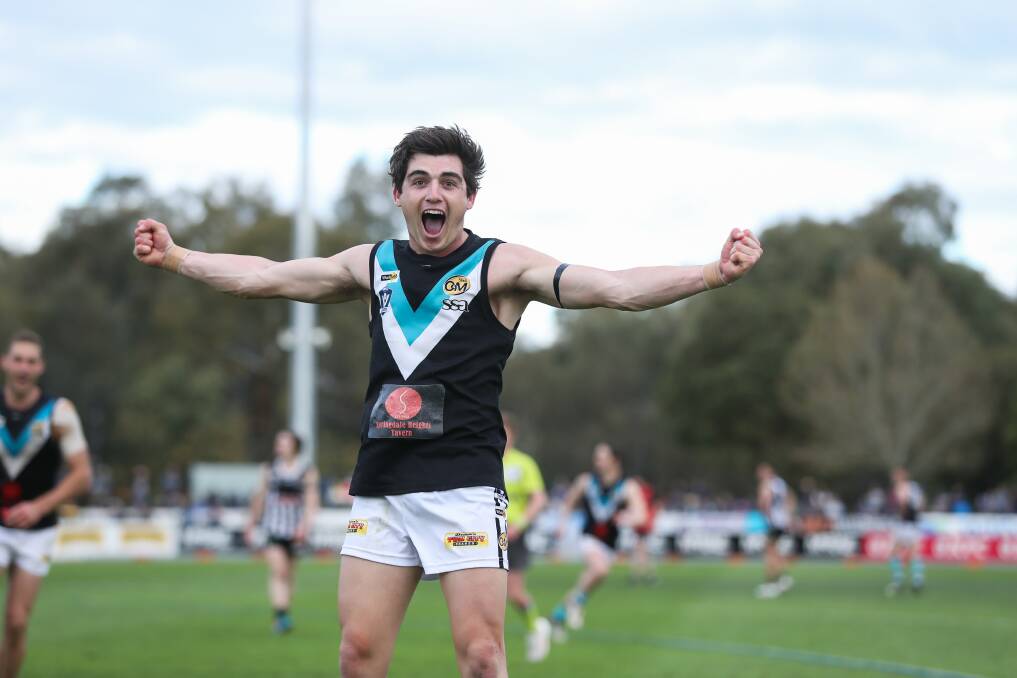 Lavington's Shaun Mannagh celebrates a goal in last year's grand final win over Wangaratta. Mannagh is considering a stint in Canberra, pending VFL commitments.