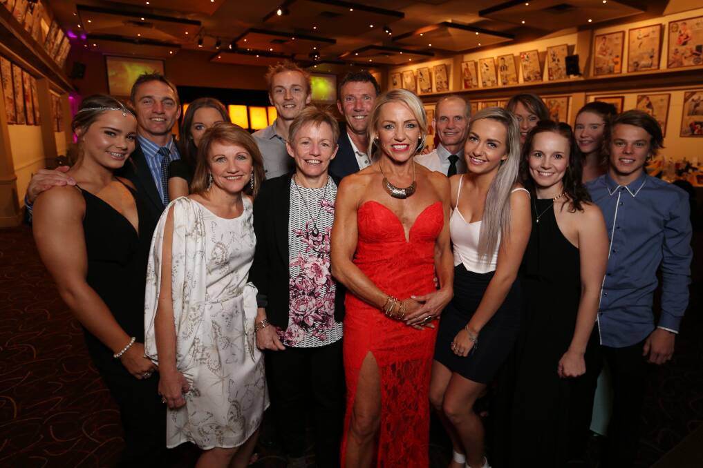Lindy Burgess-Singleton (in red) was the O and M's first Hall of Fame netball inductee and has just been confirmed in the league's Team of the Past 25 Years.