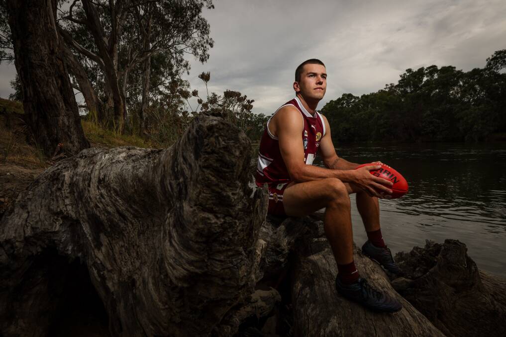 The Ovens and Murray Football Netball League is based around the Ovens and Murray Rivers as Wodonga's Oscar Willding takes in the latter. Picture by James Wiltshire