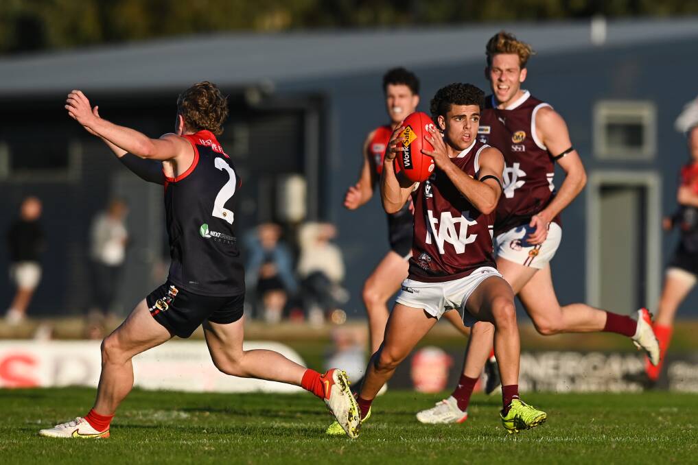 Wodonga (with the ball) has won six matches this year, including the Anzac Day game against Wodonga Raiders, and is targeting eight for the season.