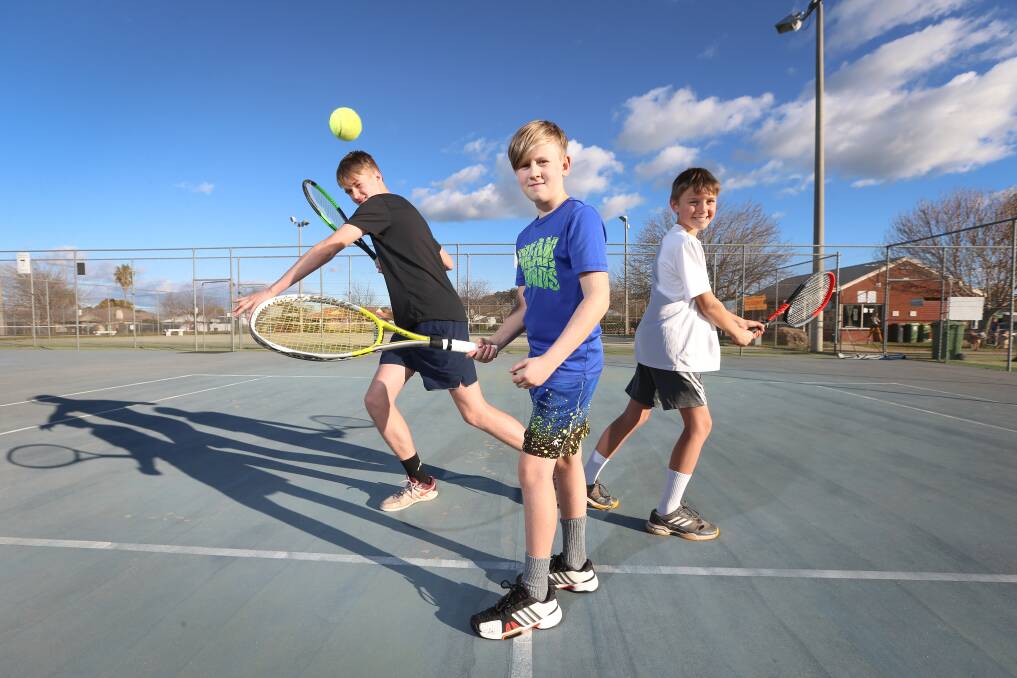 THREE'S (NOT) A CROWD: The Flanagan family moved from Melbourne with Sean, 16 (left), Keiran, 10, and Markas, 13, joining a tennis academy. Picture: JAMES WILTSHIRE