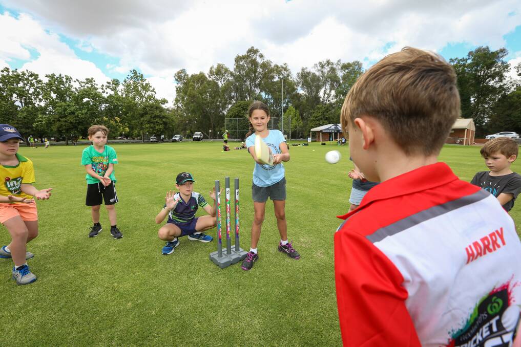 FUN TIMES: Madi Tuffey, 8, lines the ball up while batting at the Thunder's Cricket Blast, which serves as an introduction to the sport. Picture: JAMES WILTSHIRE