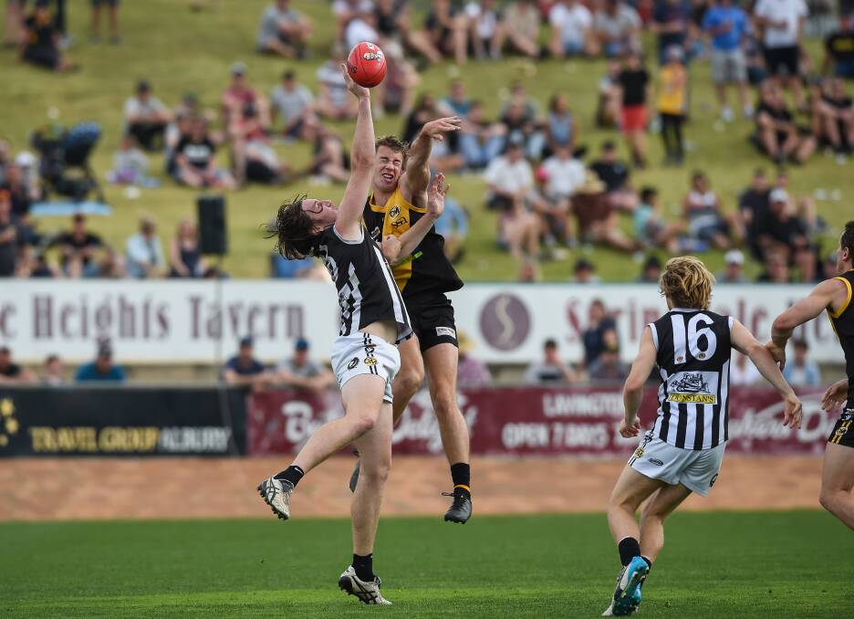 Albury's Brady Morton (in mid-air) broke the hearts of Wodonga Raiders in last year's second semi when he kicked the match-winner with under a minute left.
