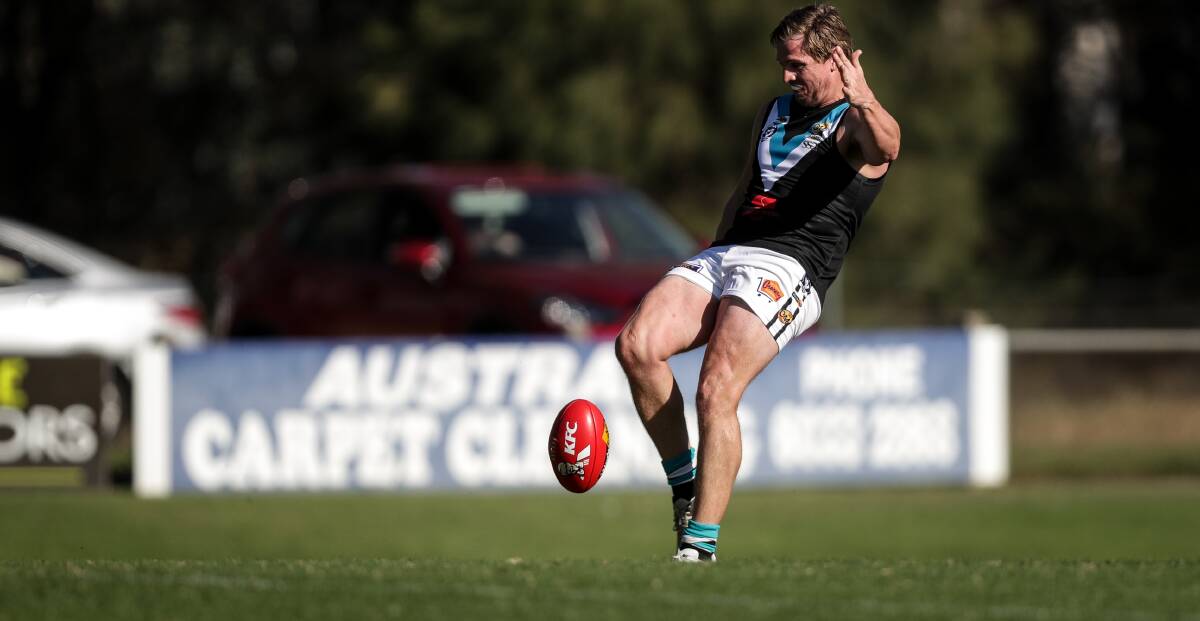 HE'S BACK: Lavington forward Adam Prior returned
with a bang after a seven-month spell, kicking six
goals in a quarter against the Roos.
Picture: JAMES WILTSHIRE