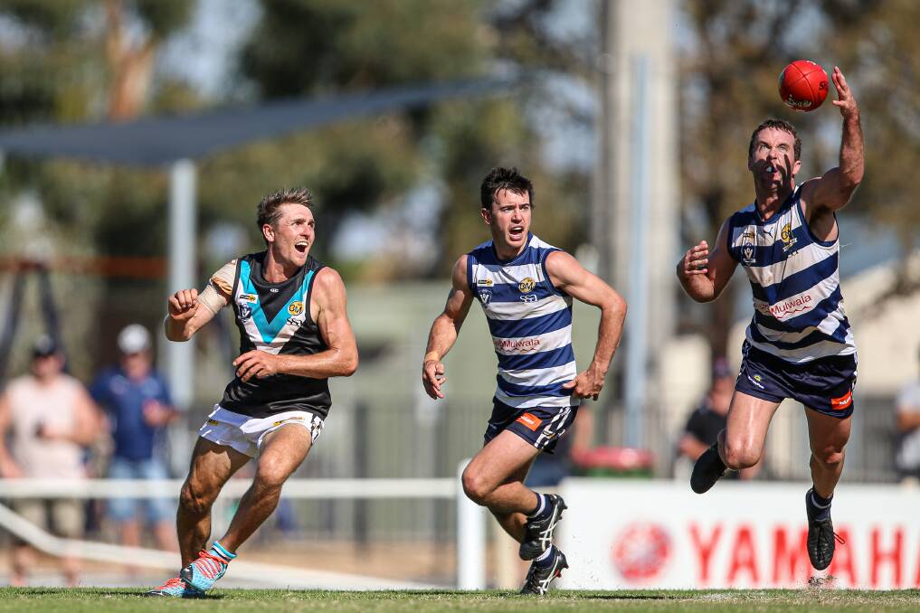 LESLIE LEGACY: Yarrawonga's Xavier Leslie (right) became the first player in the club's proud history to play 300 games. Picture: JAMES WILTSHIRE