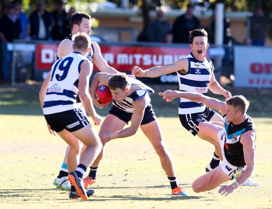 Yarrawonga's Mark Whiley broke his hand in this game against Lavington on June 3. He's not expected to play again this season in a bitter blow to the Pigeons' hopes.