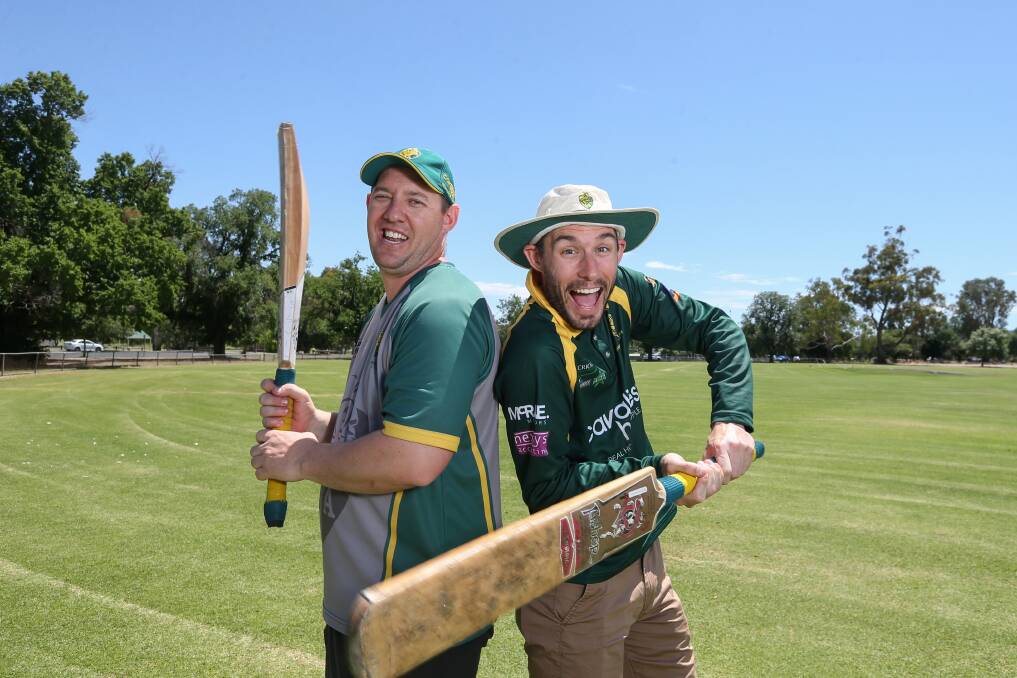 HAVING A BALL: Brothers Tim (left) and Anthony Hartshorn enjoy a laugh
after posting an unbeaten double century stand against
Wodonga Raiders. Picture: TARA TREWHELLA