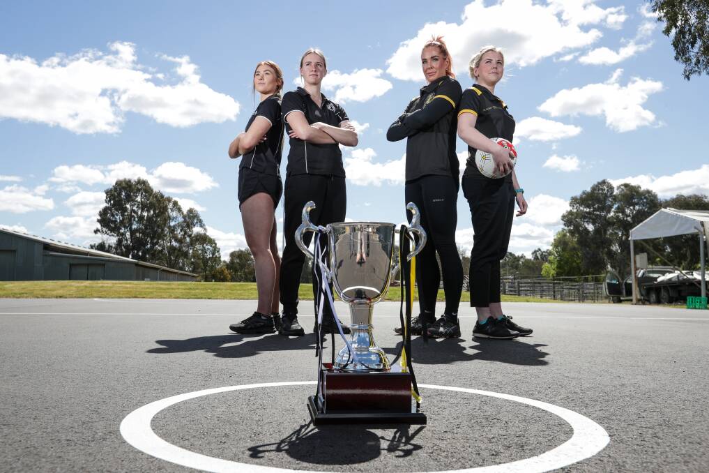 BIG DAY: Neither team has a flag, so it's thrilling for Pies' Mikaela Trethowan (left) and Hannah Grady and Tigers' Olivia Aughton and Justine Willis. Picture: JAMES WILTSHIRE