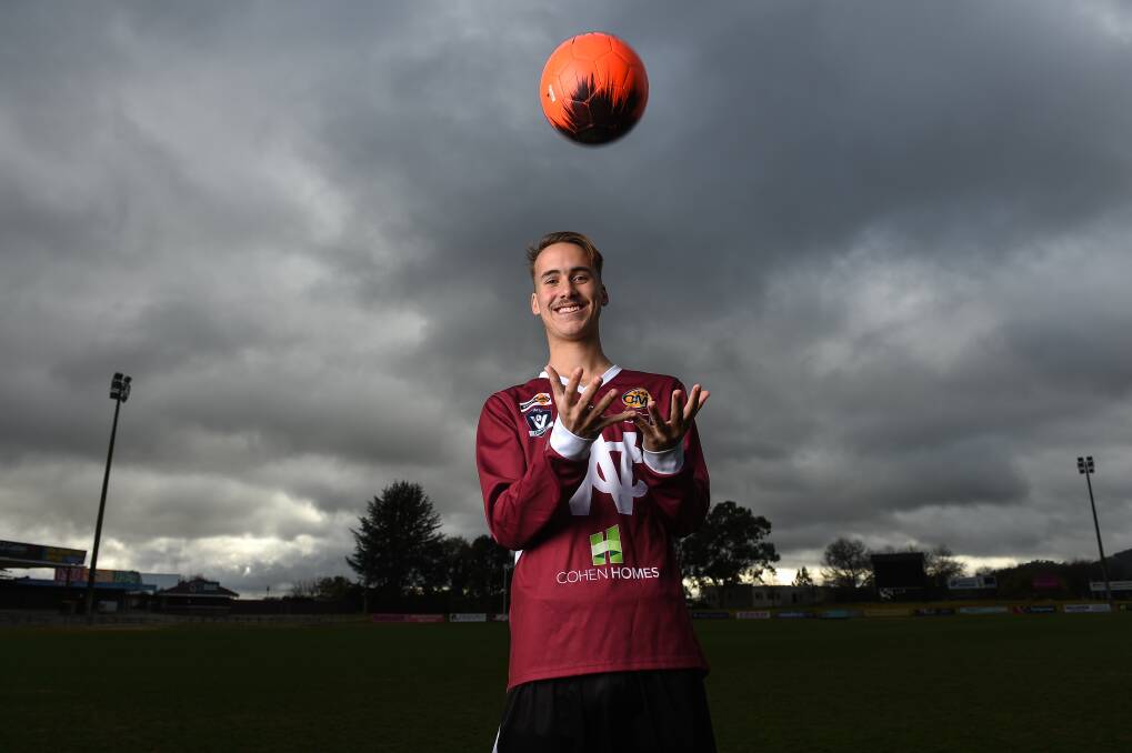 MIX 'N MATCH: Noah Spiteri wears his Wodonga football top, with his Boomers FC soccer shorts. Picture: MARK JESSER