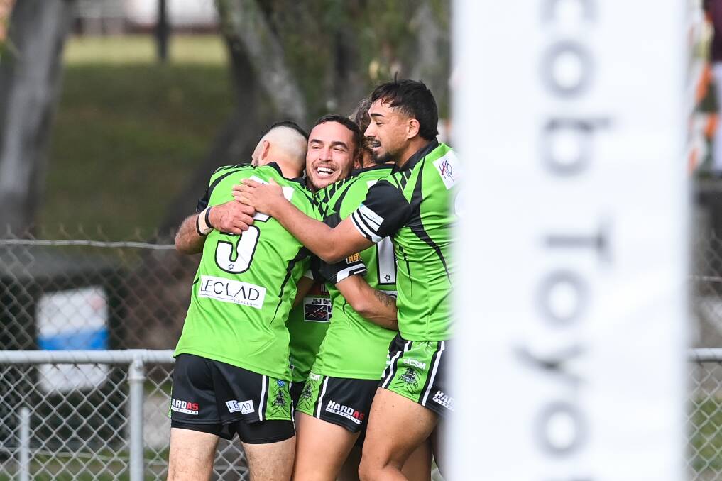 Thunder players celebrate a try against the Bulls on May 7.