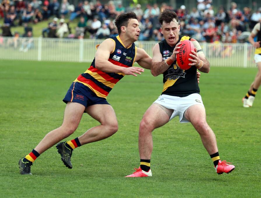 Jake Wood (left) played for Leeton Whitton in the 2020 AFL Riverina Championship, falling to Wagga Tigers in the grand final. Picture: THE DAILY ADVERTISER