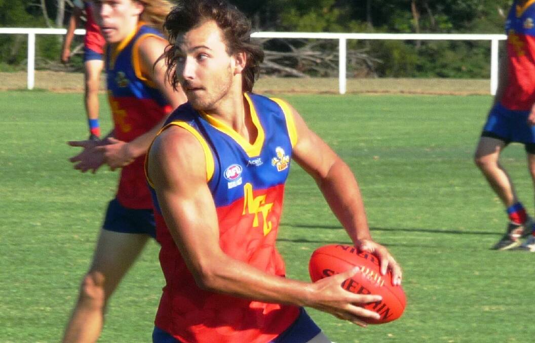 LION TO A TIGER: Jai Reed played with the Narooma Lions, when free of GWS commmitments last year, but he's now an Albury Tiger. Picture: NAROOMA NEWS