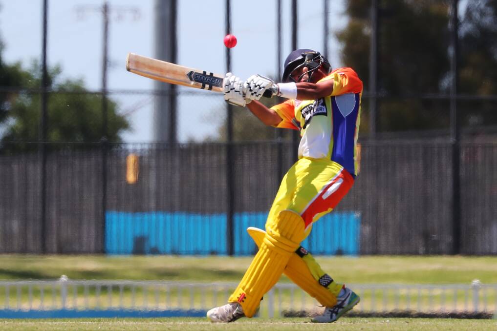SO CLOSE: Border Bullets' Mahesh Kodamullage tries to smash Wagga's
attack out of Robertson Oval. The Bullets were pipped by the
home side. Pictures: EMMA HILLIER