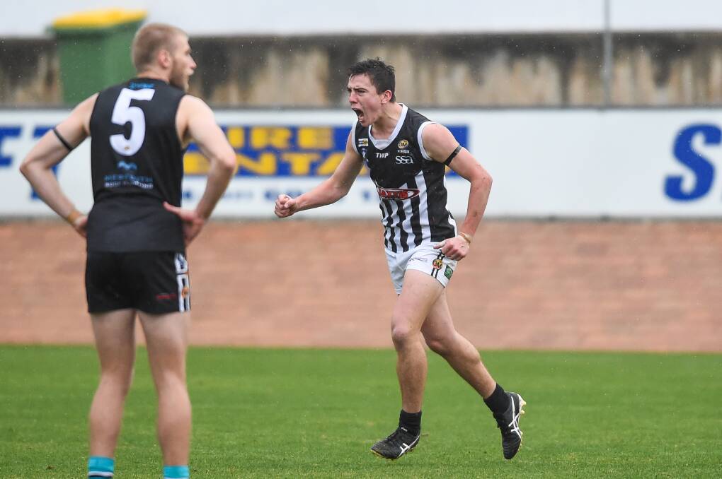 Wangaratta's Daniel Sharrock (celebrating) injured his knee the week after this game against Lavington in June, 2018, and is hoping to finally regain his best form.