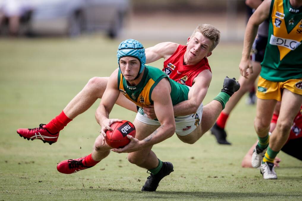 TOUGH TACKLE: Wodonga Raiders and North Albury played a practice game with the former taking the win. Clubs will ramp up their preparation in the coming weeks. Pictures: JAMES WILTSHIRE