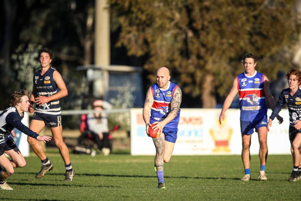 Thurgoona's Daniel Kannenberg looks to move the ball against Rutherglen in the TDFL's last competition round on July 10. The league won't play on Saturday due to COVID.