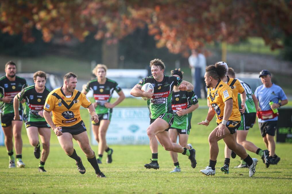 Thunder's Harry Reicher charges ahead during the club's stunning win over long-time powerhouse Gundagai by four points.
