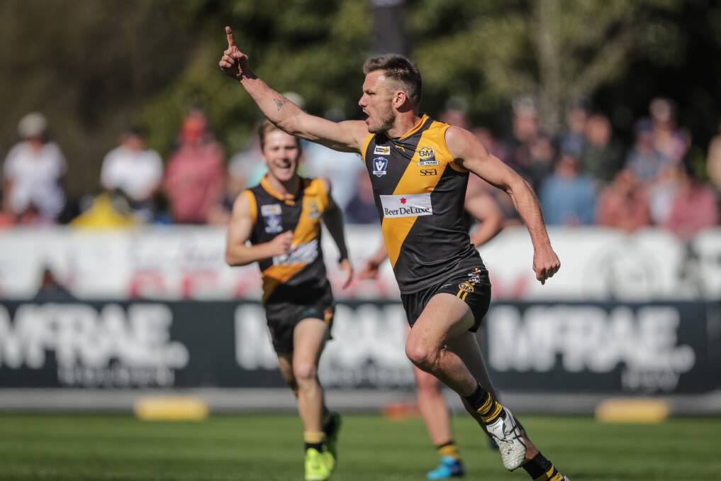 Dean Polo celebrates his goal in the 2018 grand final win over Wangaratta. He's also a Morris Medal runner-up.