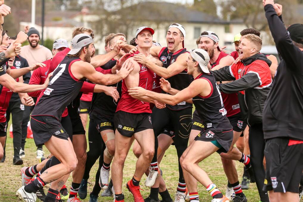 WHAT A MOMENT: Border product Doulton Langlands is swamped
by his St Kilda team-mates when told he will debut against the
Western Bulldogs. Picture: ST KILDA FC