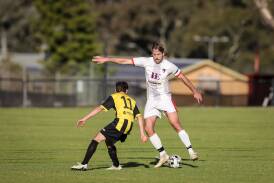 Boomers FC's Max Lynch cuts an imposing figure against Cobram Roar on Sunday. Picture by James Wiltshire