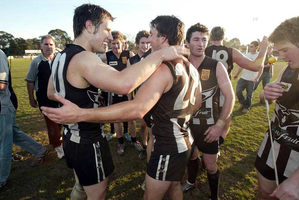 Wangaratta players celebrate winning the 2005 qualifying final against Lavington at Albury Sportsground. The Pies won a thriller by 13 points.