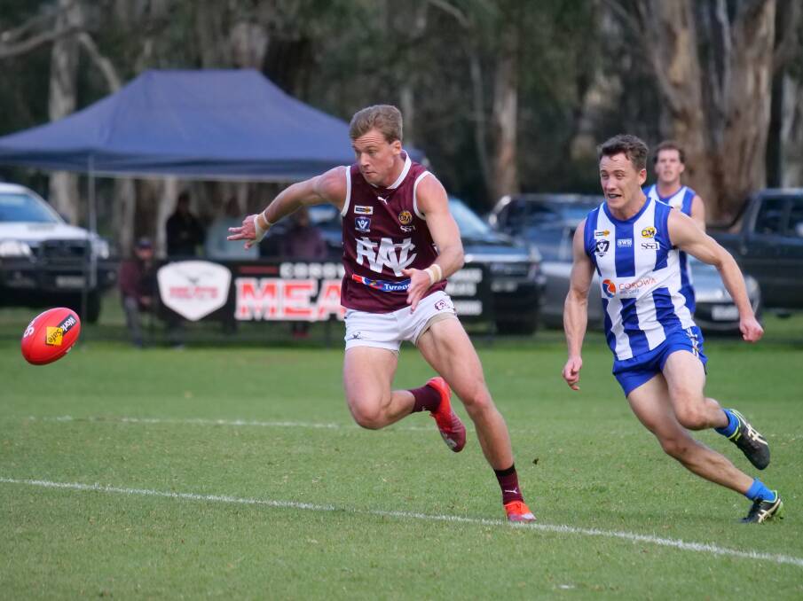 GUT-WRENCHING: Wodonga's Angus Baker (front) chases the ball in the club's thrilling three-point loss to Corowa-Rutherglen on Saturday. Picture: SIMON GINNS PHOTOGRAPHY