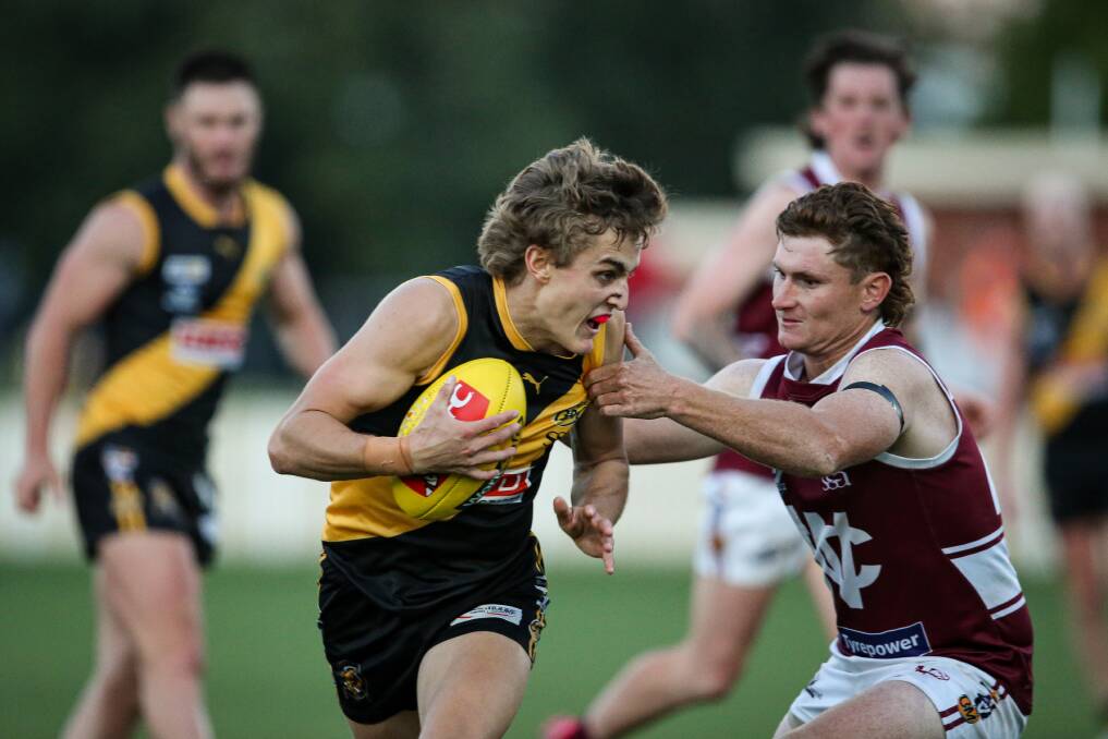 Wodonga's Jacob Barber (right) was trying to stop Albury's Mitchell Scott last year and he will again battle the Tigers' on-ballers in round one.