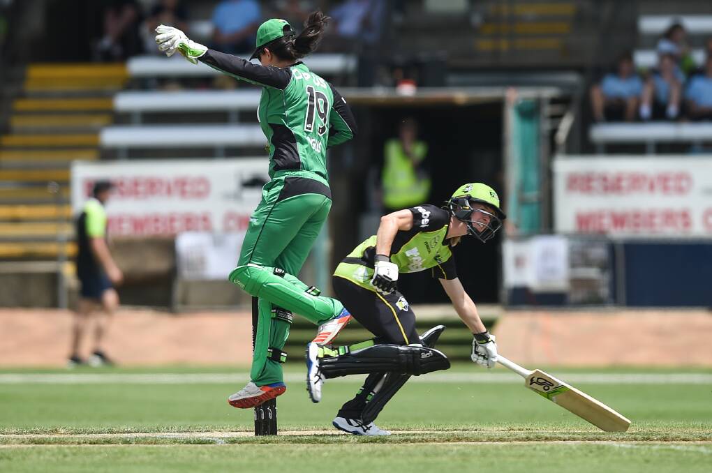Sydney Thunder's Rachael Haynes makes her ground in last year's inaugural WBBL Border Bash match against Melbourne Stars.